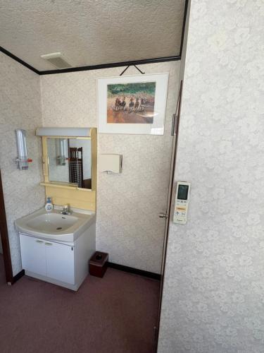 Ένα μπάνιο στο お宿まるとや