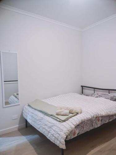 Ένα ή περισσότερα κρεβάτια σε δωμάτιο στο A private room