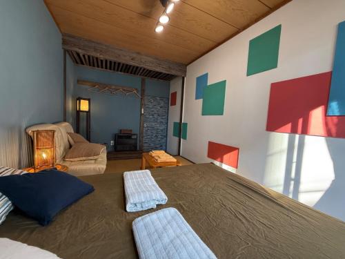 Ένα ή περισσότερα κρεβάτια σε δωμάτιο στο TRAX NUNOBA - Vacation STAY 02612v