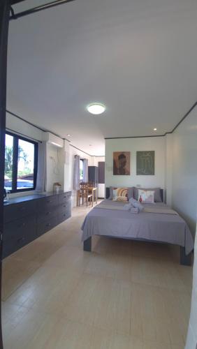 Postel nebo postele na pokoji v ubytování Malaika Residence