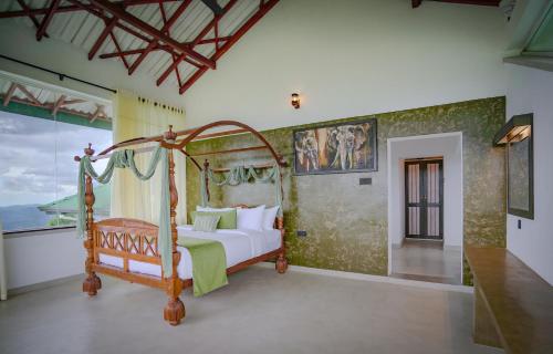 Ένα ή περισσότερα κρεβάτια σε δωμάτιο στο The Colonial Crest