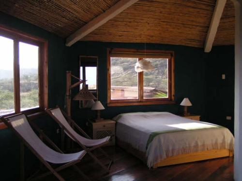 Postel nebo postele na pokoji v ubytování Vista del Mar Casa y Bungalows
