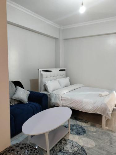 Ένα ή περισσότερα κρεβάτια σε δωμάτιο στο Luxe Homes