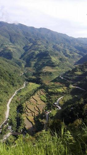 an aerial view of a river in a valley at Native Village Inn in Banaue