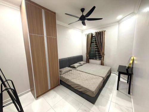 Ένα ή περισσότερα κρεβάτια σε δωμάτιο στο Guest House Taman Universiti 3 bedroom