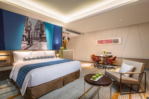 Postel nebo postele na pokoji v ubytování Radisson Blu Shanghai Pudong Jinqiao