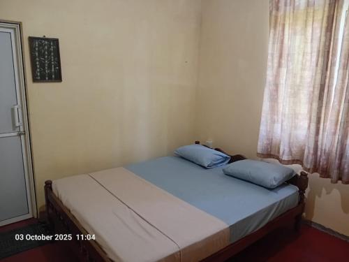 Postel nebo postele na pokoji v ubytování Camping Site Bambaragala