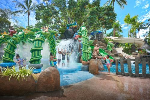 a water park at a resort with a waterfall at Shangri-La Golden Sands, Penang in Batu Ferringhi