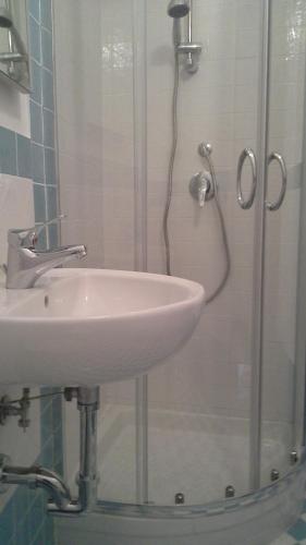 Phòng tắm tại Appartamento Andromeda
