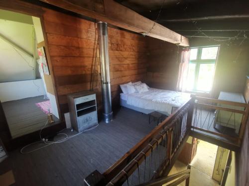 Postel nebo postele na pokoji v ubytování Katikara Eco-Community - Rosewood accommodations