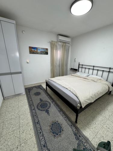 Ένα ή περισσότερα κρεβάτια σε δωμάτιο στο Home