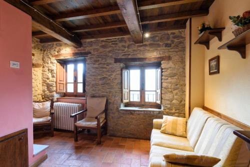 Posezení v ubytování Il Borgo Dei Corsi - Charming Holiday Apartments