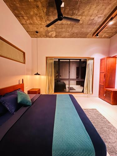 Giường trong phòng chung tại Hill Brown Resort