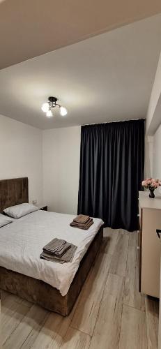 Ένα ή περισσότερα κρεβάτια σε δωμάτιο στο MC House