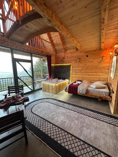 Postel nebo postele na pokoji v ubytování Golikti dağevleri