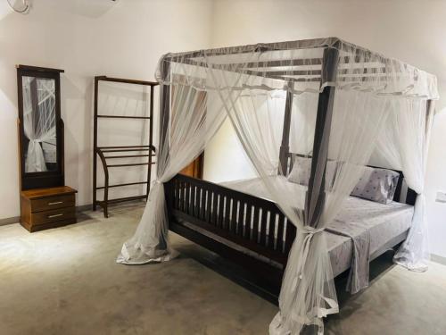 Postel nebo postele na pokoji v ubytování Oshi villa