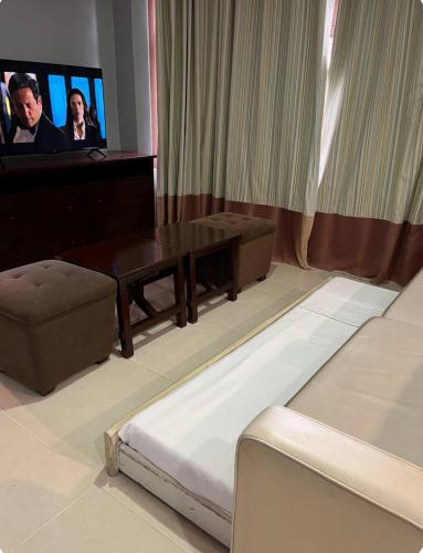 Μια τηλεόραση ή/και κέντρο ψυχαγωγίας στο One bedroom at Crosswinds