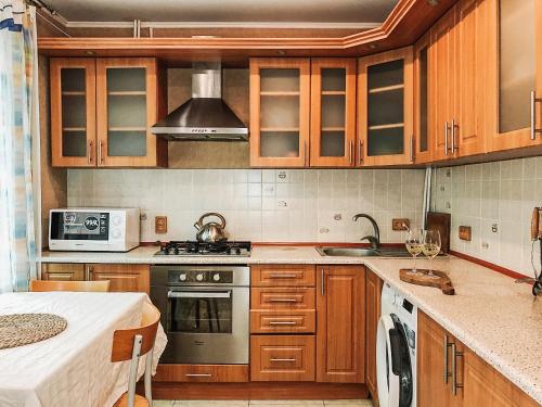 Η κουζίνα ή μικρή κουζίνα στο Отель Маленький Рай