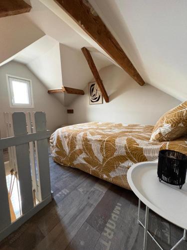 Ένα ή περισσότερα κρεβάτια σε δωμάτιο στο T2 fonctionnel 5 pers, jardin, parking, accès A12