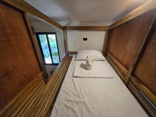 Postel nebo postele na pokoji v ubytování NATIVO D' KUBO