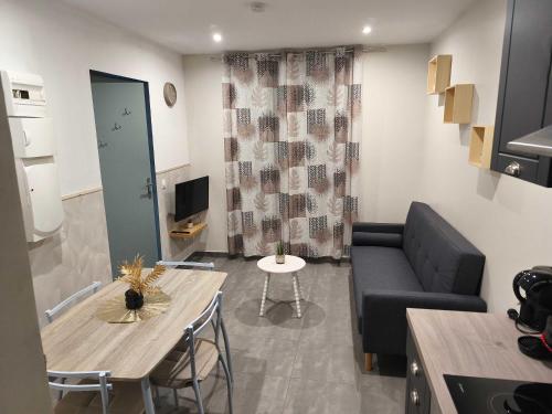 Appartement RDC avec parking au centre-ville
