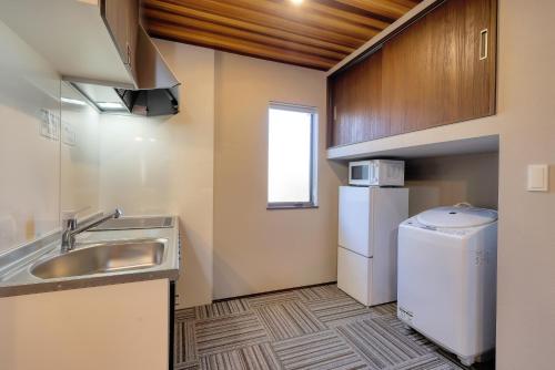 Kuchyň nebo kuchyňský kout v ubytování 又楽坊 Matarakubo