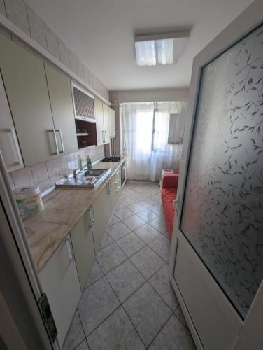 Η κουζίνα ή μικρή κουζίνα στο Fully furnished and equipped apartment