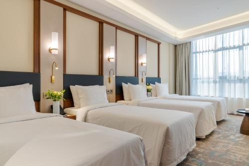 Ένα ή περισσότερα κρεβάτια σε δωμάτιο στο Ancyra Hotel - By Continent - فندق انكيرا