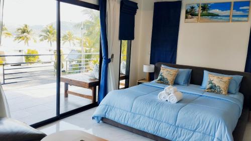 Ένα ή περισσότερα κρεβάτια σε δωμάτιο στο Leamsai Whisper Home