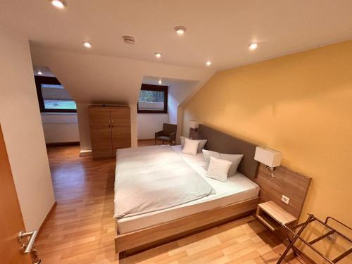 Ένα ή περισσότερα κρεβάτια σε δωμάτιο στο Hotel Herrenrest