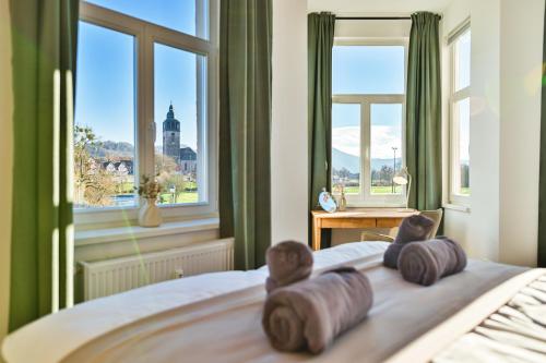 Ένα ή περισσότερα κρεβάτια σε δωμάτιο στο Luxus Apartments - Mitten in Deutschland - Perfekte Lage - Parkplatz