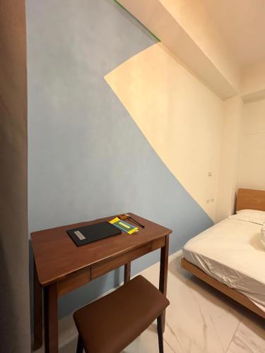 Postel nebo postele na pokoji v ubytování 5920電梯民宿