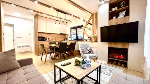 Kuchyň nebo kuchyňský kout v ubytování Triple Shine Bjelasnica & Free Garage