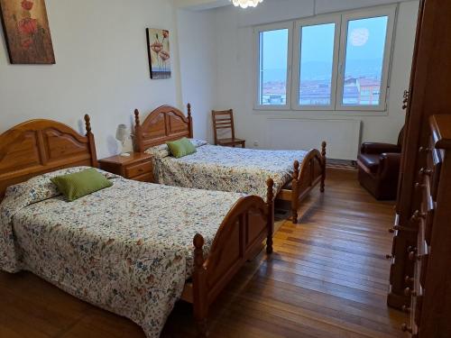 Ένα ή περισσότερα κρεβάτια σε δωμάτιο στο Torre Plaza 5