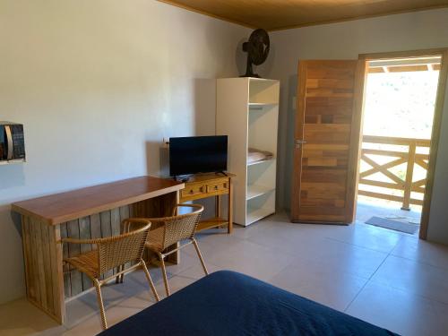 Et tv og/eller underholdning på Pousada Santa Rosa