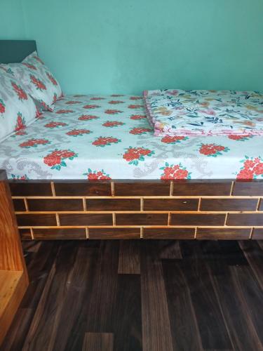 Postel nebo postele na pokoji v ubytování Yerin Homestay