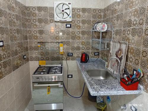 Η κουζίνα ή μικρή κουζίνα στο Sugar Nubian Guest House Nile Vew