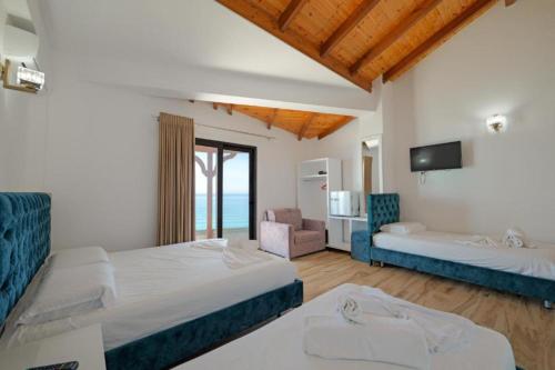 Postel nebo postele na pokoji v ubytování Villa Summer Borsh