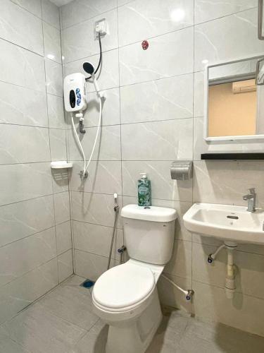 Koupelna v ubytování Garden Inns Motel