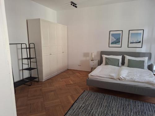 Una cama o camas en una habitación de Innsbruck Residence