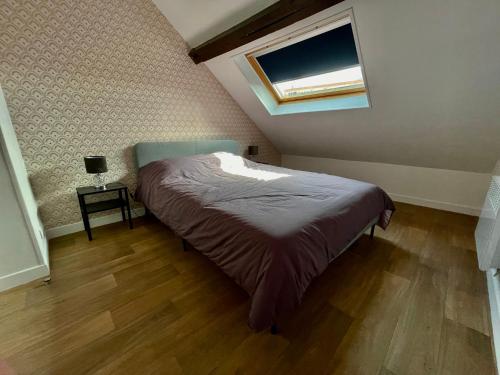 เตียงในห้องที่ Champagne Cocooning