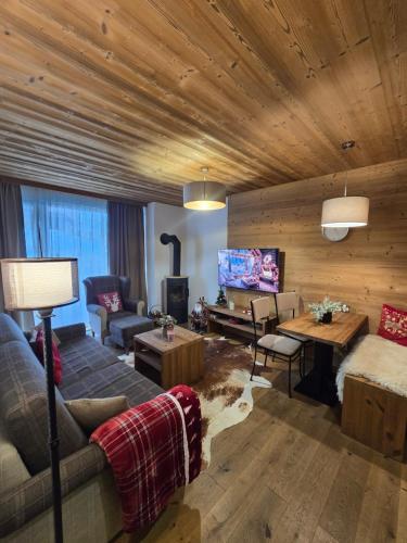 Posezení v ubytování Chalets VIVA Jasná & jacuzzi