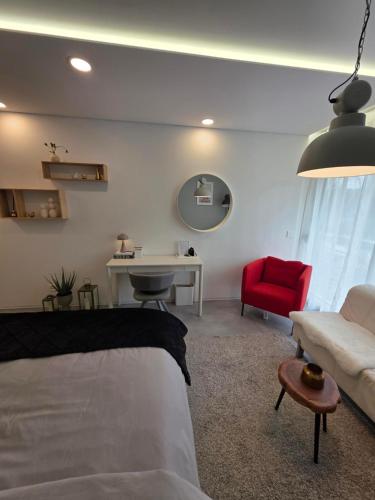 Ένα ή περισσότερα κρεβάτια σε δωμάτιο στο SO Fribourg City Center with Garden !