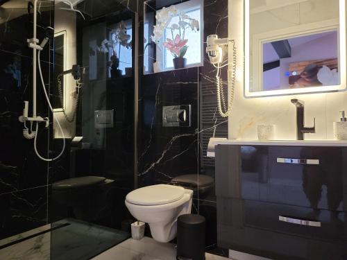 Et badeværelse på TABATA FITNESS Apartments DEVA