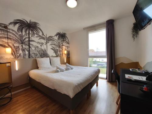 Ένα ή περισσότερα κρεβάτια σε δωμάτιο στο Résidence calme-2 pers-parking gratuit-clim