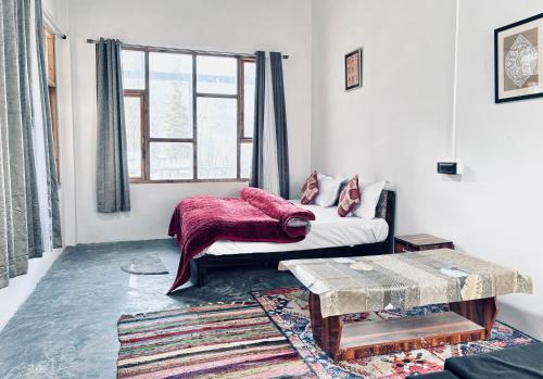 Ένα ή περισσότερα κρεβάτια σε δωμάτιο στο High on hills