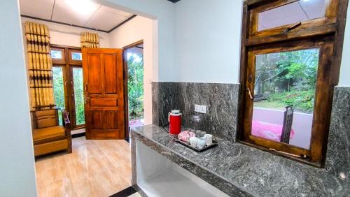 Ένα μπάνιο στο Sri Bhavan Ella