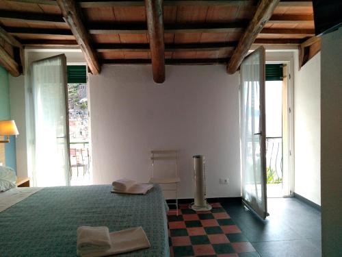 Rúm í herbergi á Hotel Gianni Franzi