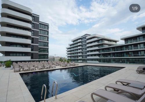 Swimmingpoolen hos eller tæt på Apartament vedere la mare Odyssey