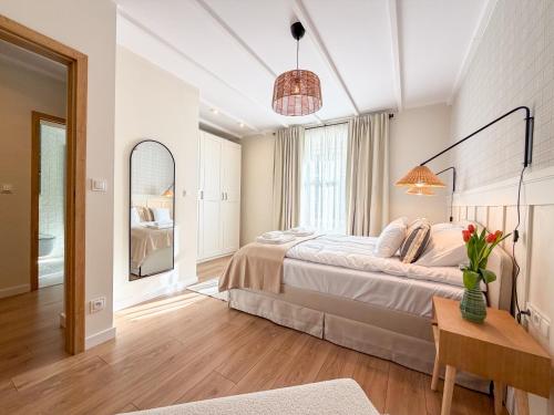 En eller flere senge i et værelse på Pod Karkonoskim Nurtem